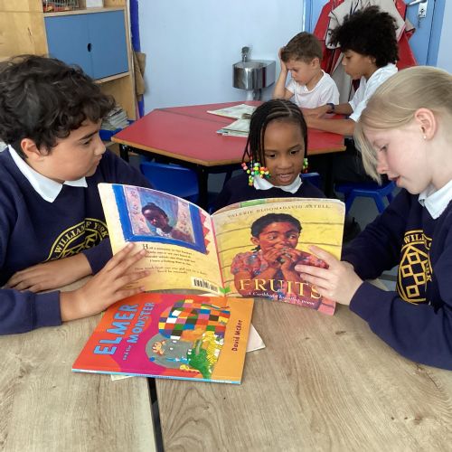 Reception & Year 6 buddy time reading